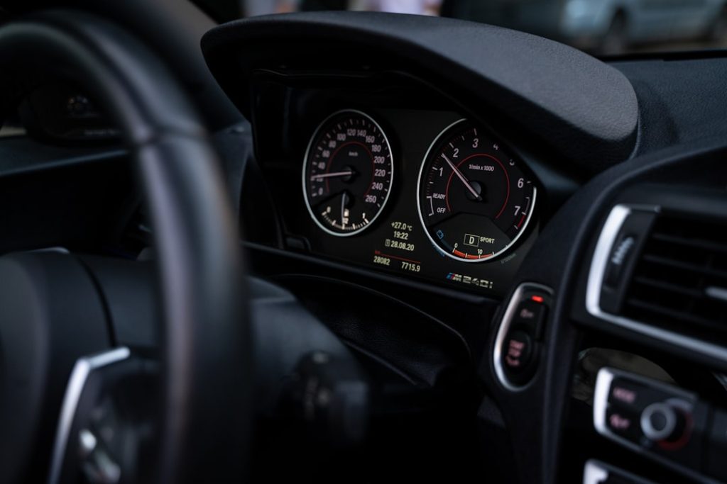 Home the-dashboard-of-a-car-with-a-speedometer-and-gauges-fq45hrkalre